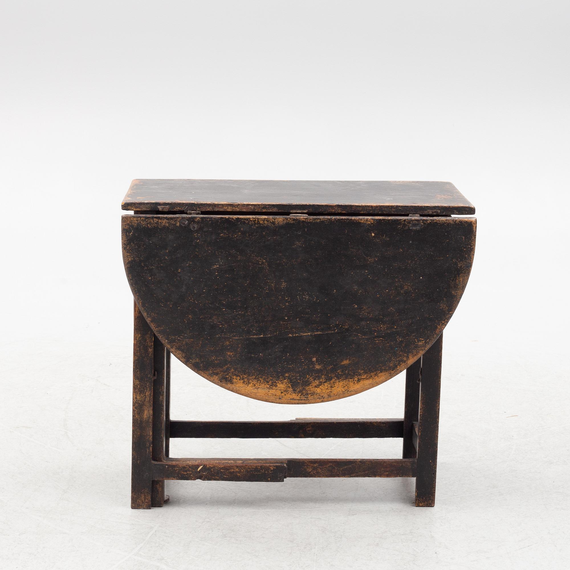 A Swedish wooden table, 19th century.