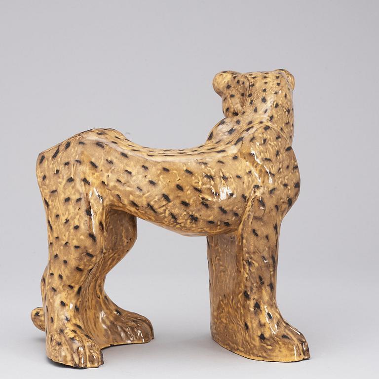 A Vicke Lindstrand yellow glazed ceramic figure of a cheetah, Upsala-Ekeby 1949, model 3003.