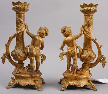 LJUSSTAKAR, ett par, metall, nyrokoko, sent 1800-tal.