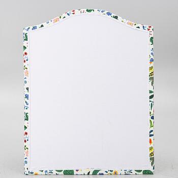 Headboard, upholstered in fabric from Svenskt Tenn.