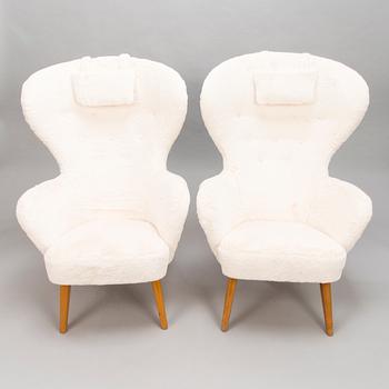 CARL GUSTAF HIORT AF ORNÄS, Two mid-20th century 'Siesta' armchairs for för Puunveisto Oy - Träsnideri Ab.