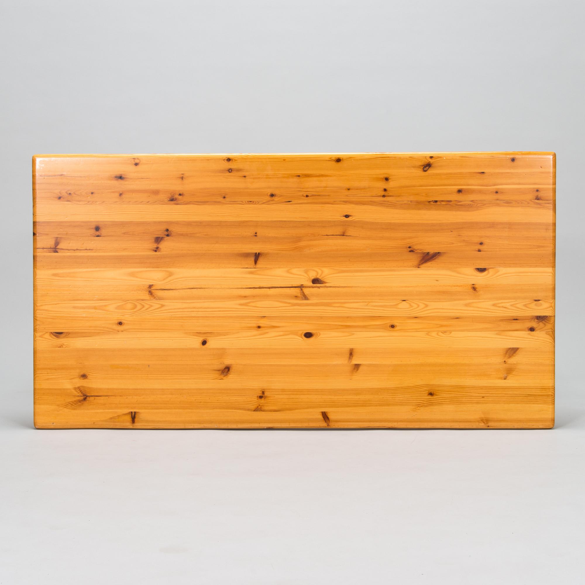 A pine wood and rattan table, late 20th century.
