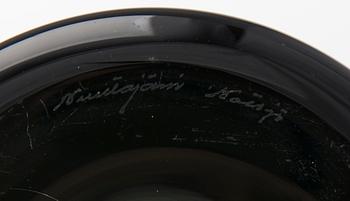 A candlestick signed Nuutajärvi Notsjö.