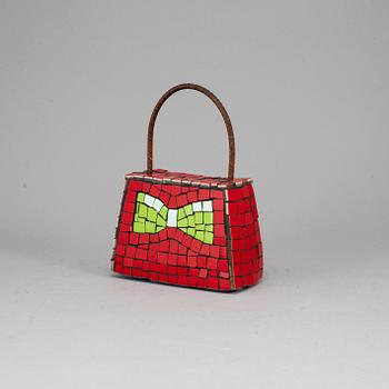 A mosaic sculpture by Marie Hellström.