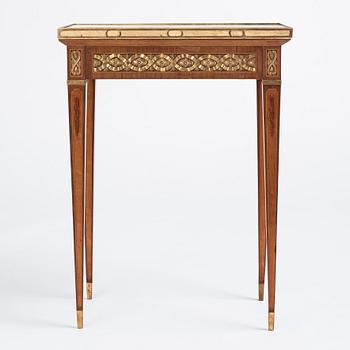 A Gustavian marquetry, ormolu-mounted, and marble table by G. Iwersson (master in Stockholm 1778-1813), signed 1781.