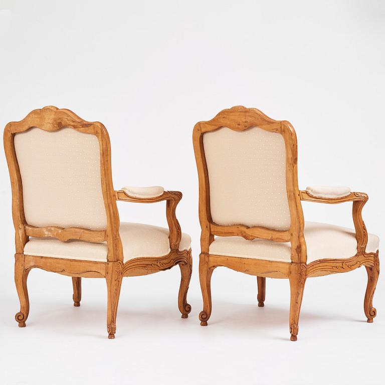 A pair of Swedish rococo fauteuils à la reine, later part of the 18th century.