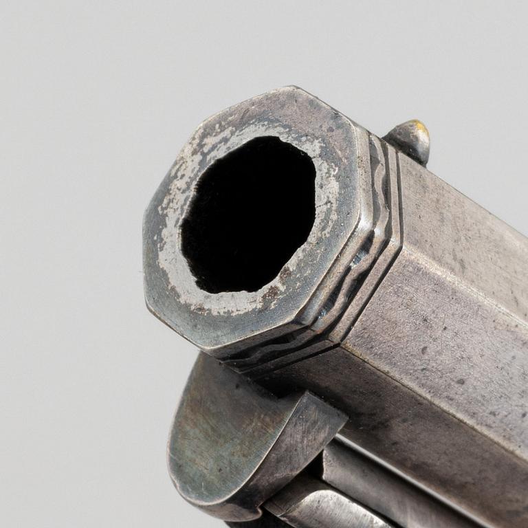 A percussion revolver, Colt 1851 Navy, in case, from the year 1863.