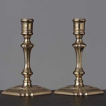 A pair of late baroque 18th century paktong candlesticks.