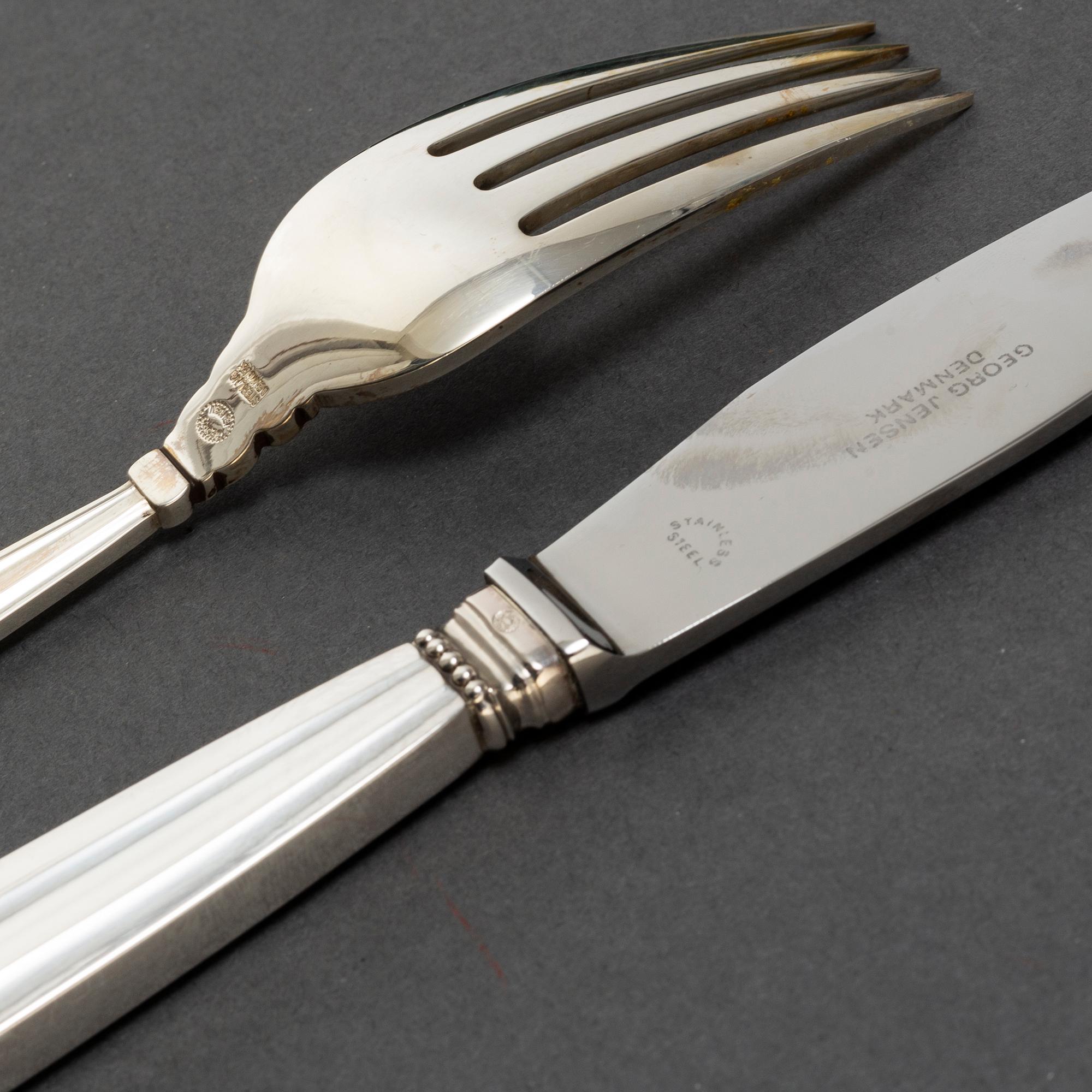 a set of eight pieces of "Konge/Acorn" flatware, Georg Jensen, Copenhagen Sterling.