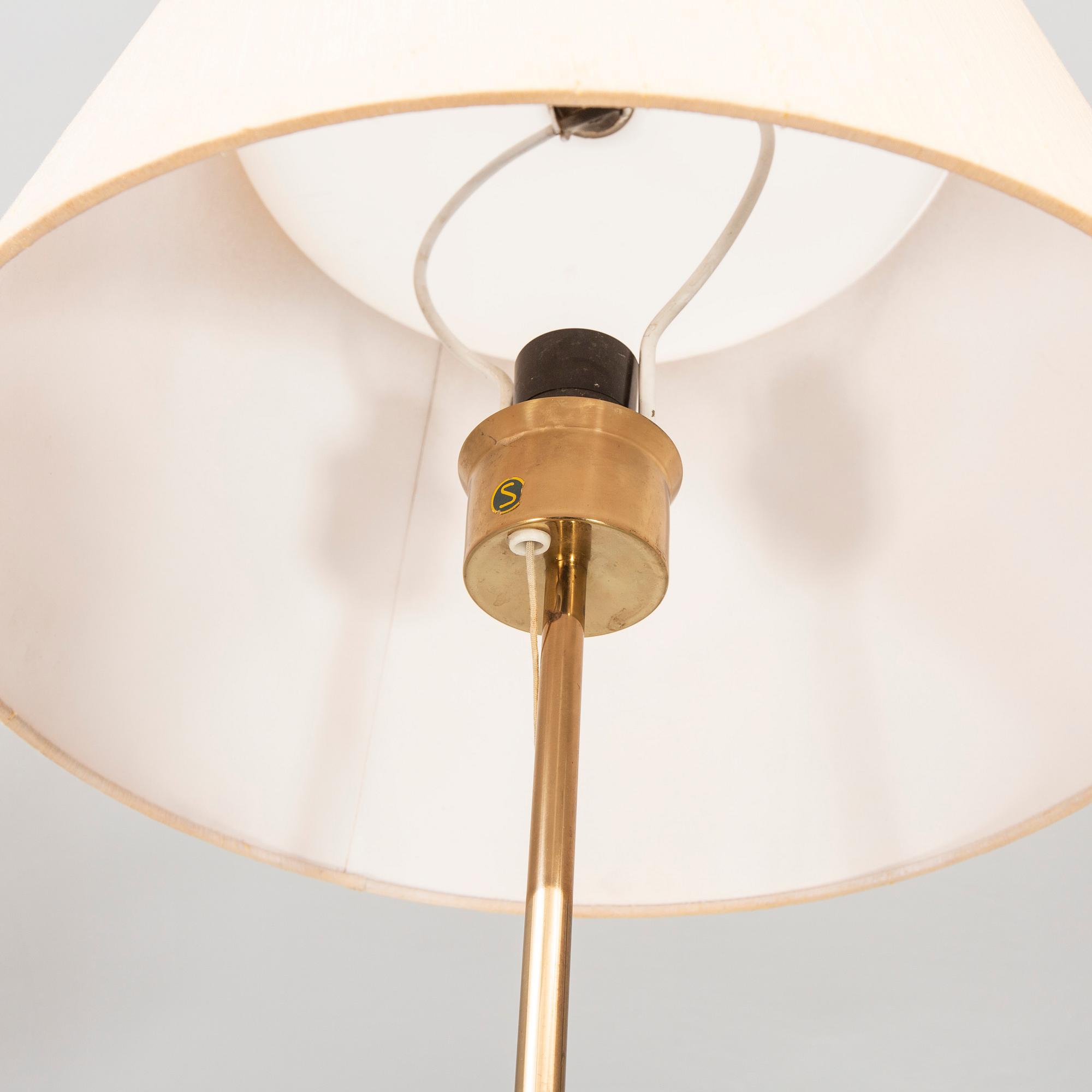 A pair of brass table lamps B024 from Bergboms later part of the 20th century.