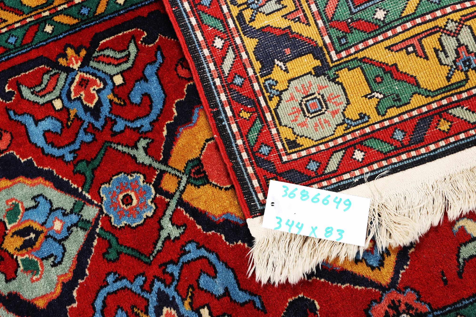 A Kazak runner carpet, c. 344 x 83 cm.
