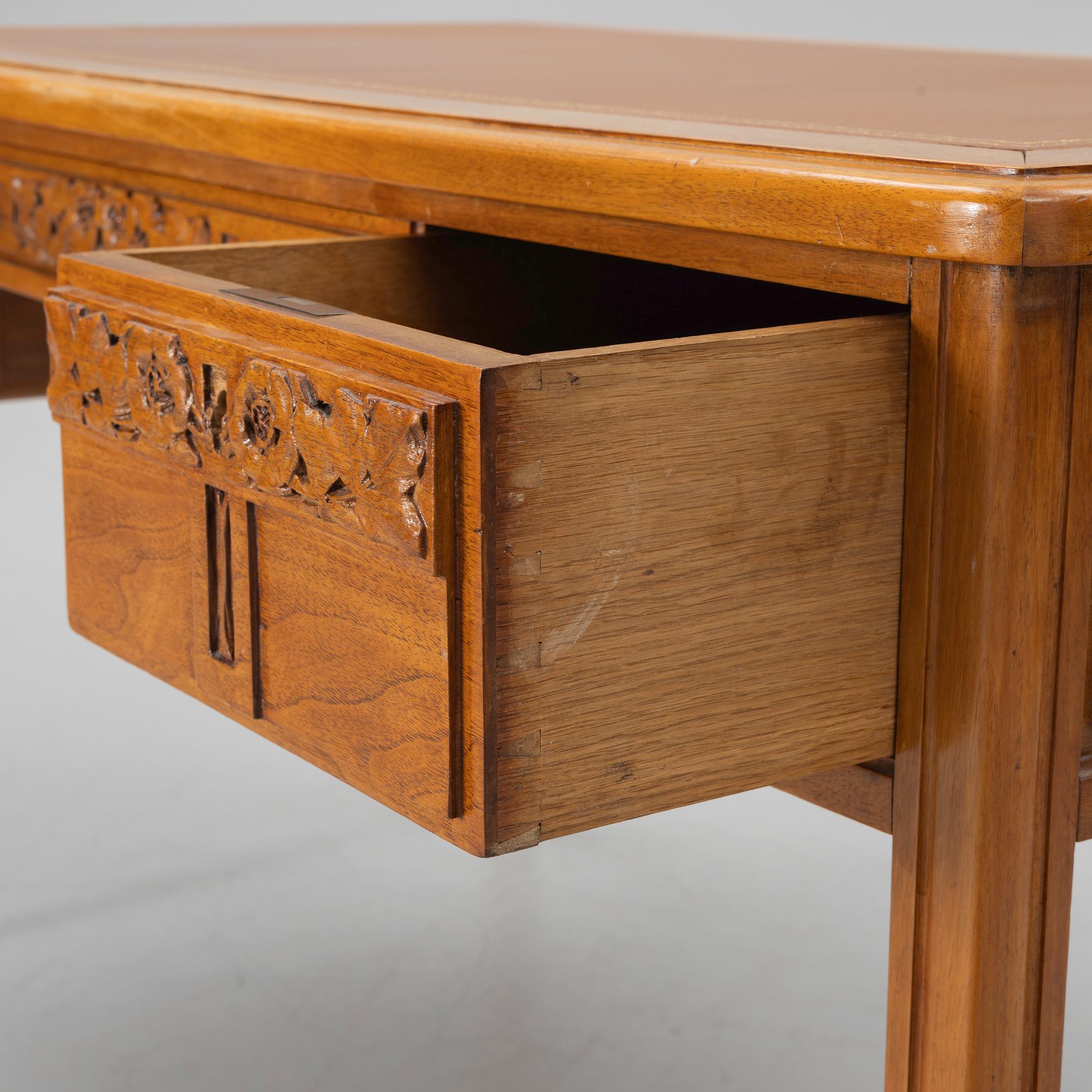 An Art Nouveau desk and chair, early 20th century.