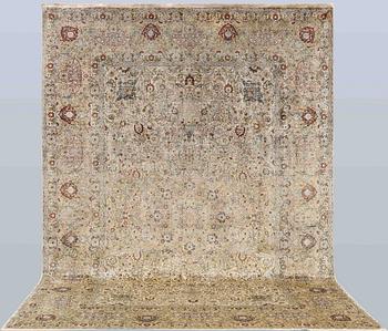 A oriental silk carpet, 350 x 247 cm.