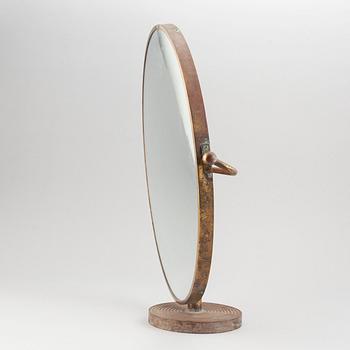 A model 2214 brass table mirror by Josef Frank for Firma Svenskt Tenn.