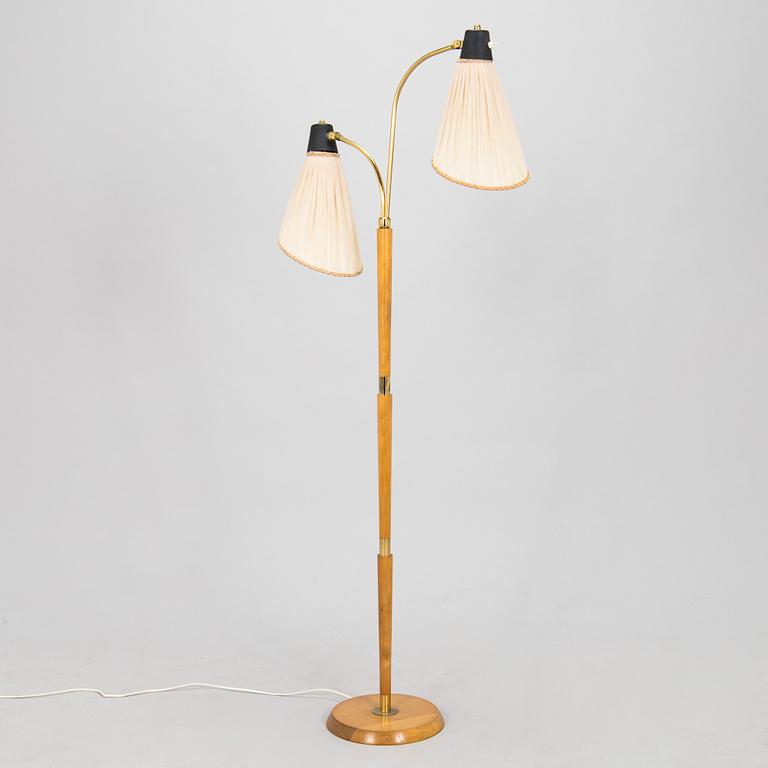 A mid-20th century floor light.