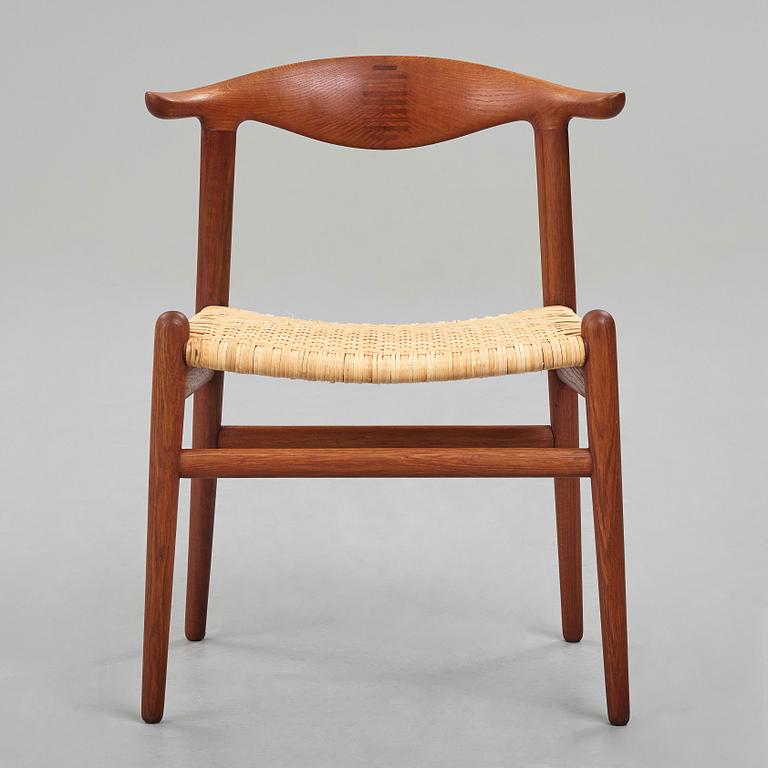 HANS J WEGNER, a teak, oak and cane "Cowhorn chair", JH 505, Johannes Hansen, Denmark 1950-60's.