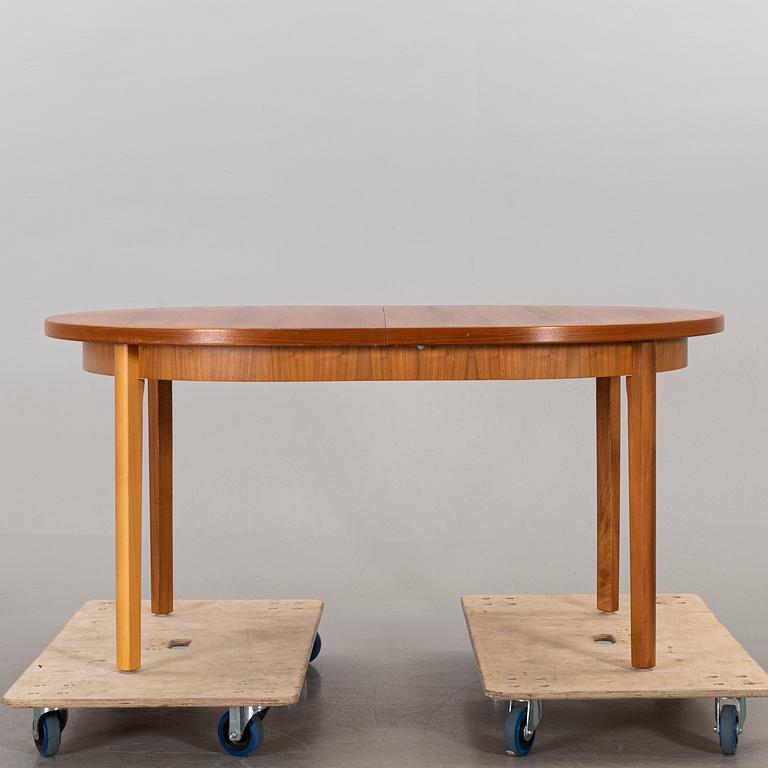 A mid 20th century teak dining table.