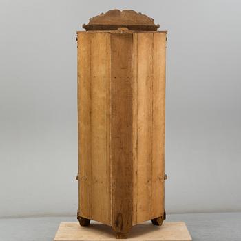 KNUT FJAESTAD, a folk art oak cabinet, signed KF 1935.