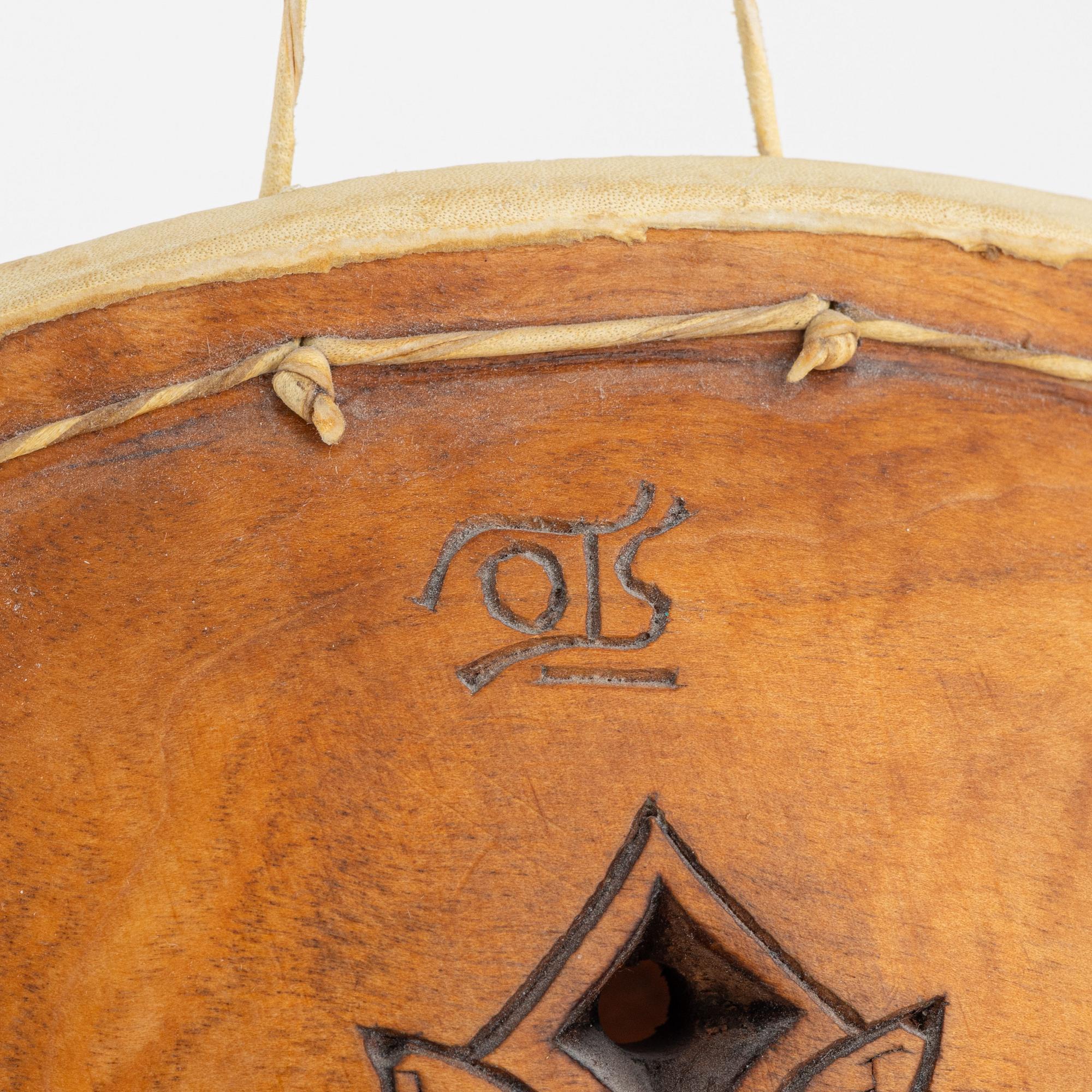 Olof Tomas Svonni, a cermonial drum, signed.