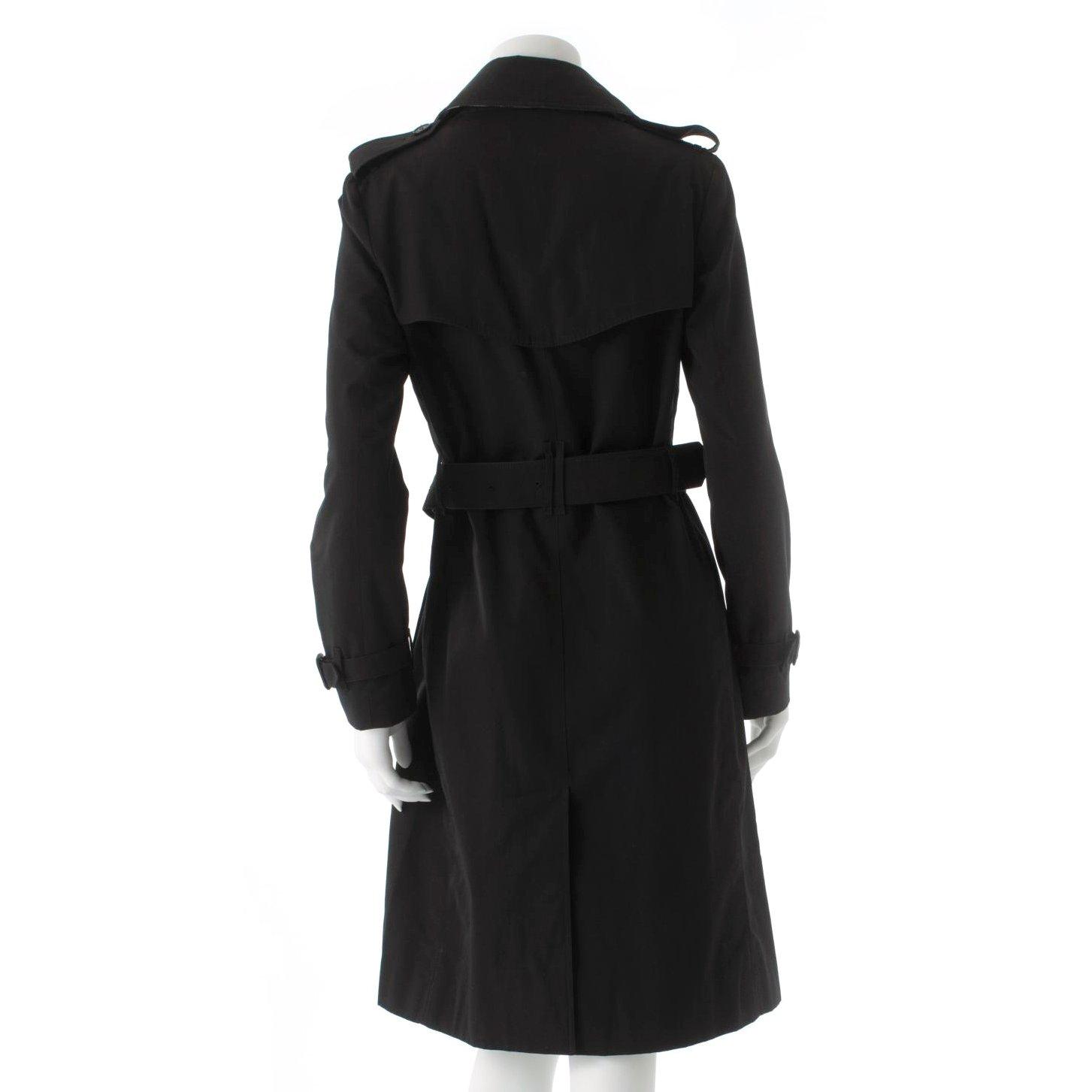 BURBERRY, a black cotton trench coat.