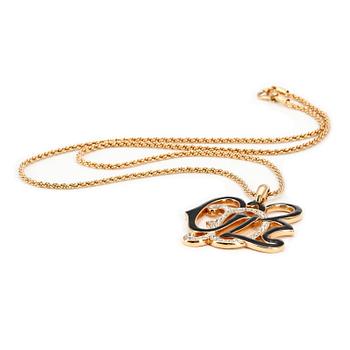 663. OSCAR DE LA RENTA, a gold colored necklace with pendant.