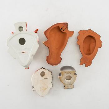 Wall masks 5 pcs including Goldscheider mid-20th century porcelain/terracotta.