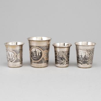A set of four Russian 19th century silver and niello vodka cups, Moscow.