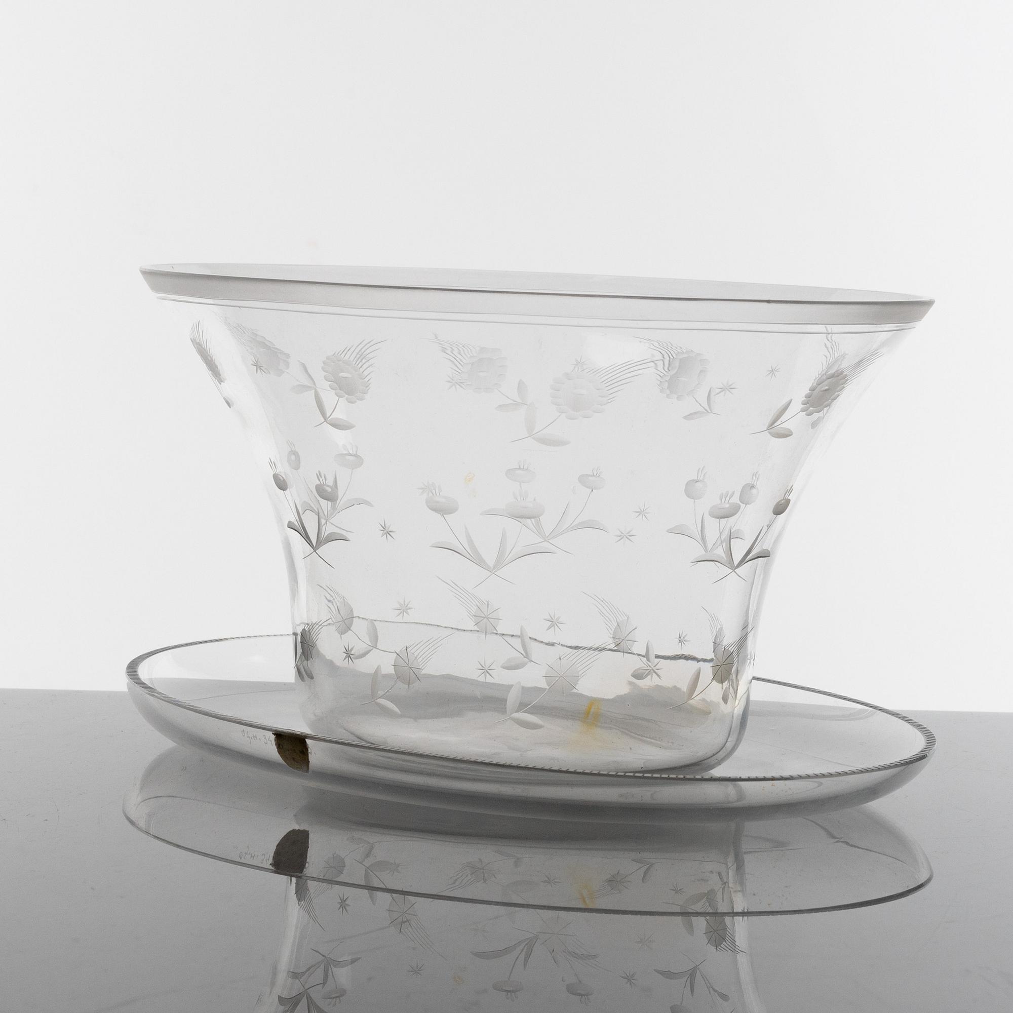 Edward Hald, an angraved glass bowl and plate, Orrefors, Sweden, model H932 and H348.