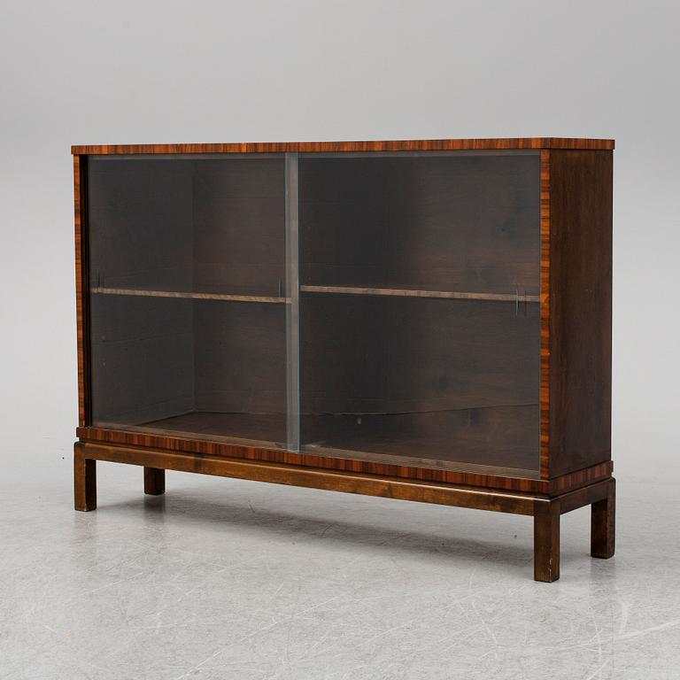 A stained birch veneered bookcase, 1930's.