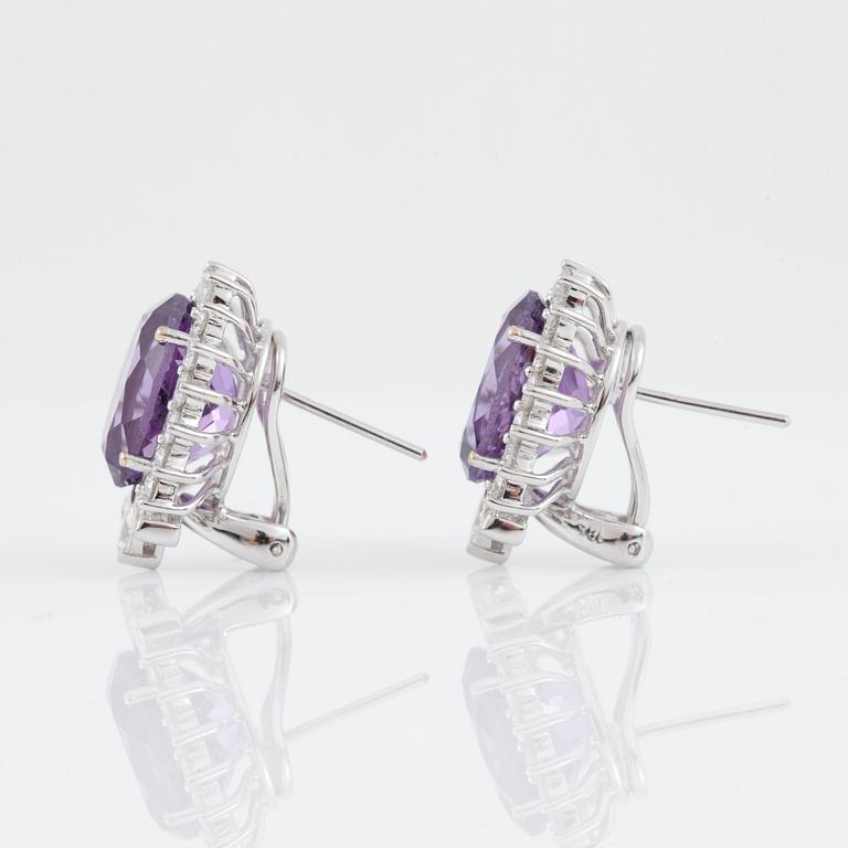 A pair of amethyst and diamond, circa 1.95 cts, earrings.