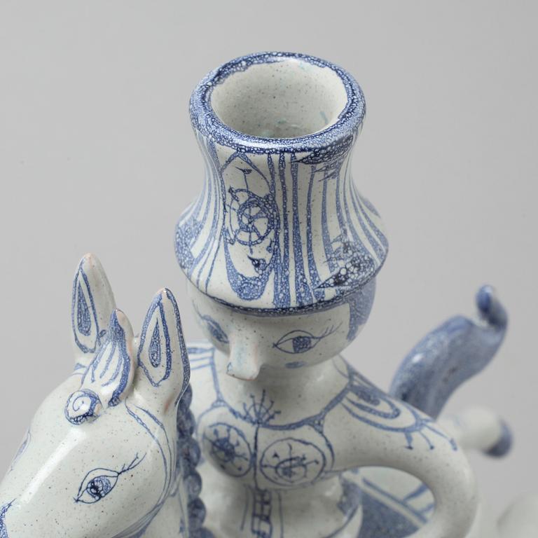 A faience candlestick and a figurine by Björn Wiinblad, signed and dated -63.