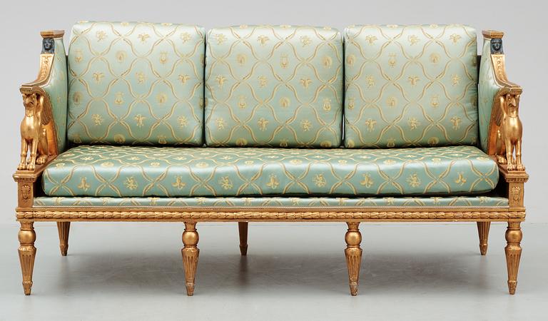 A late Gustavian early 19th Century seating, comprising seven parts (one sofa, four armchairs, two chairs).
