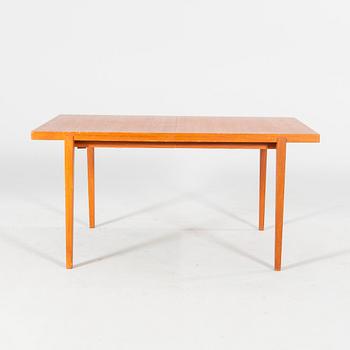 A mid 20th century dining table.