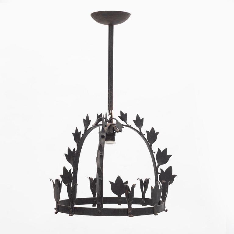 A wrought iron chandelier, first half of the 20th century.