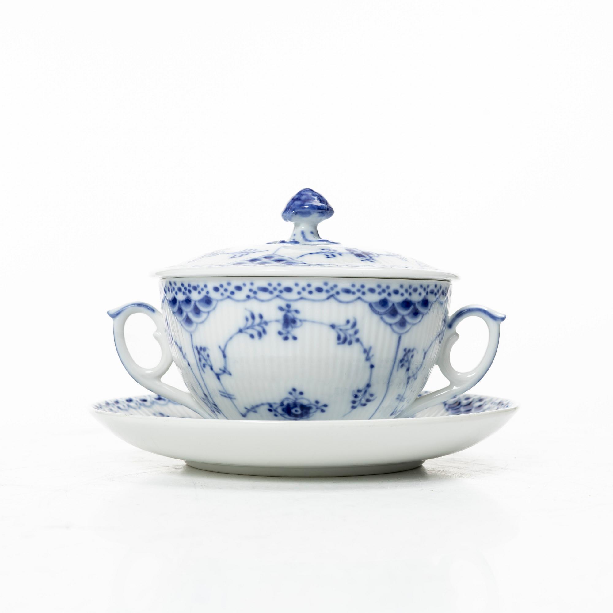 Royal Copenhagen, a set of nine consommé bowls with covers and saucers, and two cups without saucers, "Blue fluted half lace", 1960s.