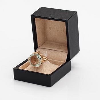 Bulgari, An 18K gold ring "Parentesi" with a green quartz and ca. 0.70 ct of brilliant cut diamonds in total.