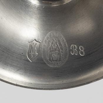 A pair of pewter candle sticks, model A702, Firma Svenskt Tenn, Sweden, 1928.