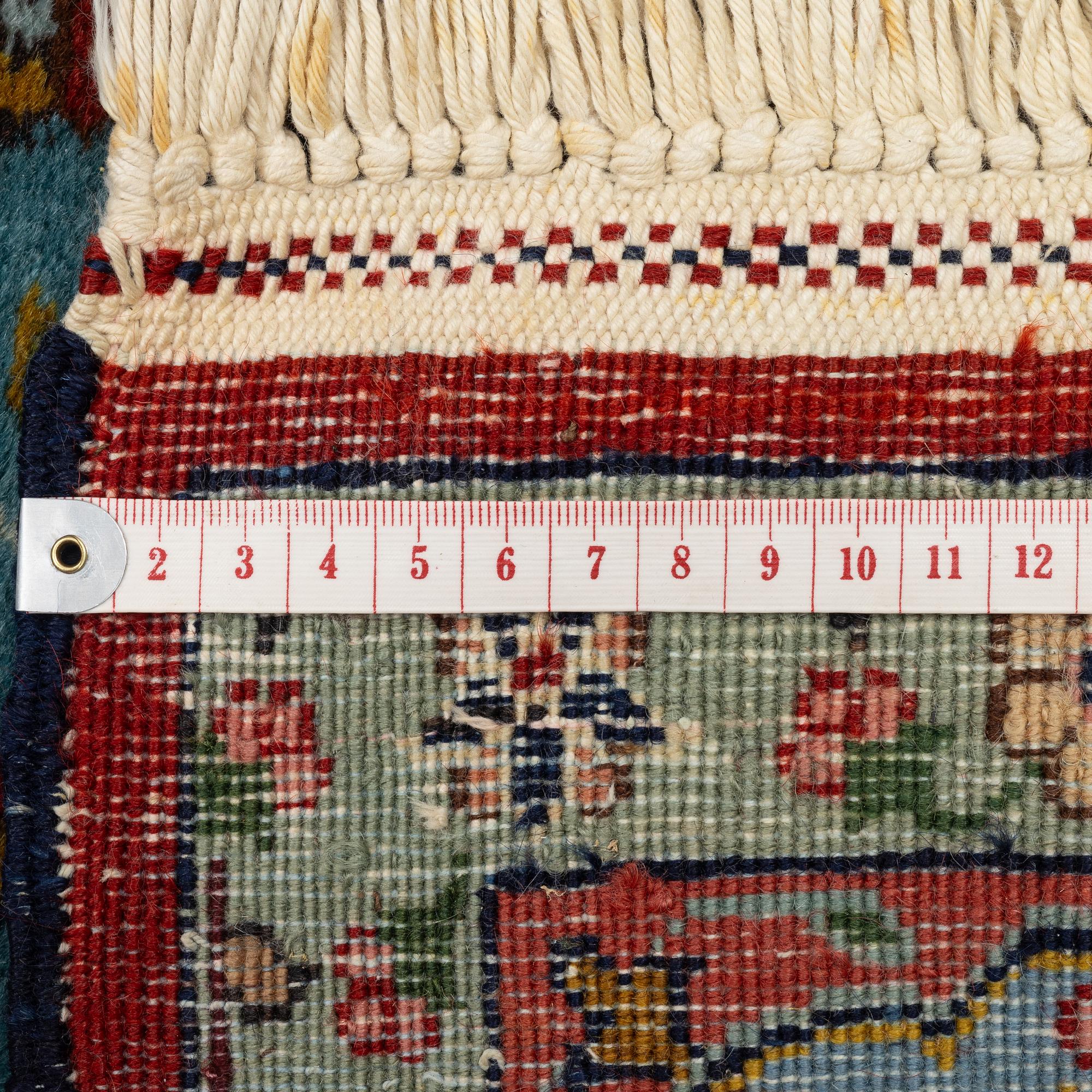 A figural Tabriz, c. 193 x 144 cm.