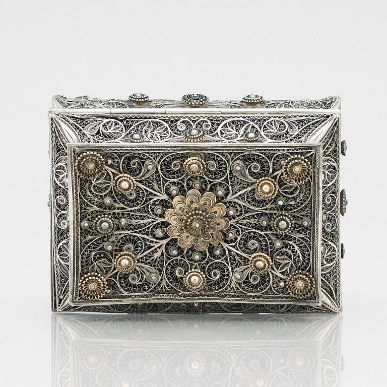 A 19th Century silver filigree box, unidentified makers mark R.K, Assay master mark of Ivan Lebedkin, Moscow 1898-1908.