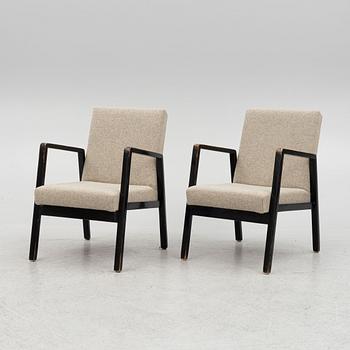 Alvar Aalto, a pair of armchairs model "403", Artek, Finland, mid-20th century.