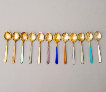 A 24-piece set of 1950s/60s enamelled and gilt silver (916) coffee spoons, Tillander, Helsinki.