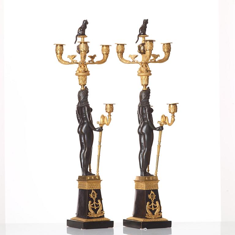 A pair of Russian Retour d'Egypte Empire Alexander I five-light candelabra, St. Petersburg.