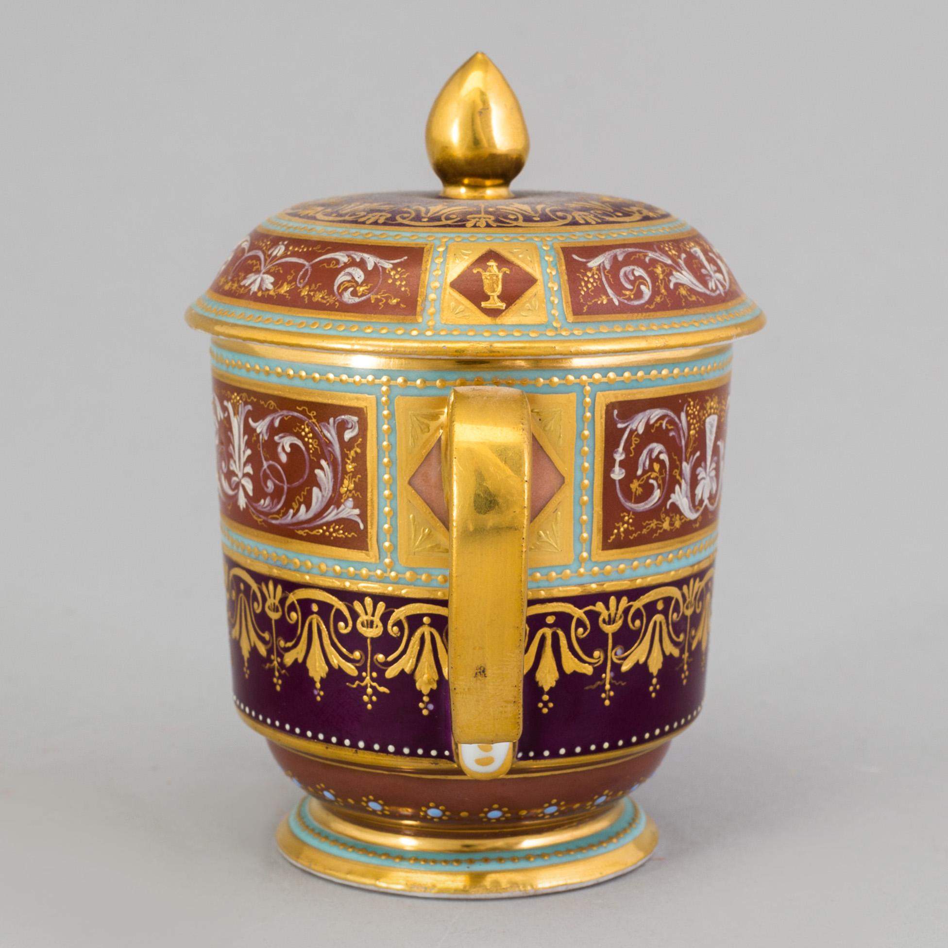 An early 19th century empire cup with saucer and cover with Wien mark.