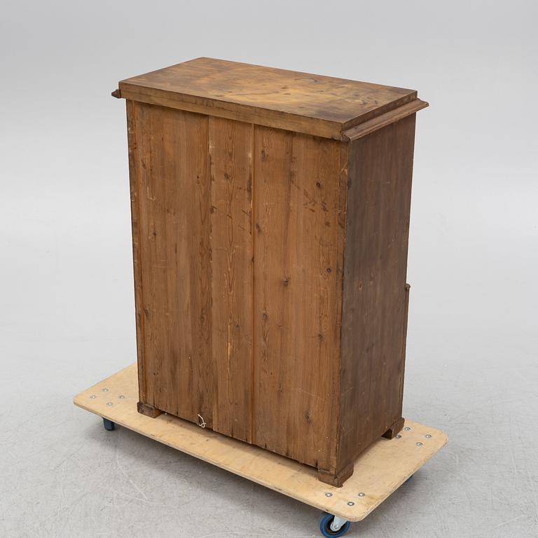 A wooden fire wood box, around 1900.