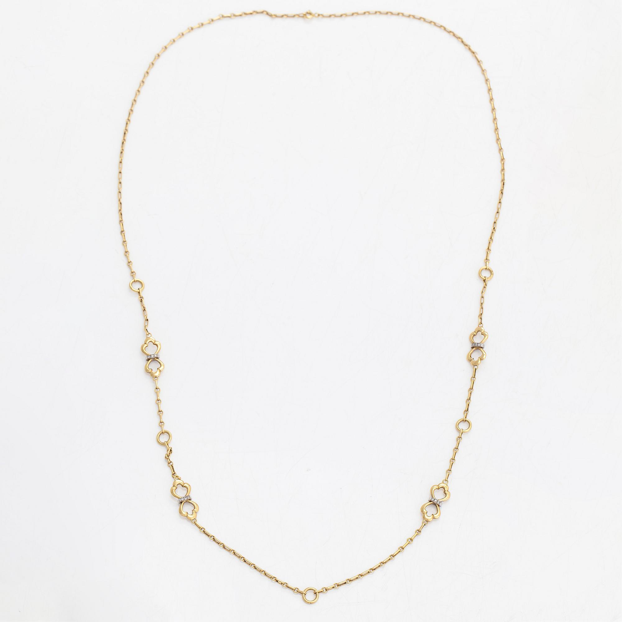 An 18K gold necklace, with diamonds totalling approx. 0.12 ct. Foreign hallmarks.