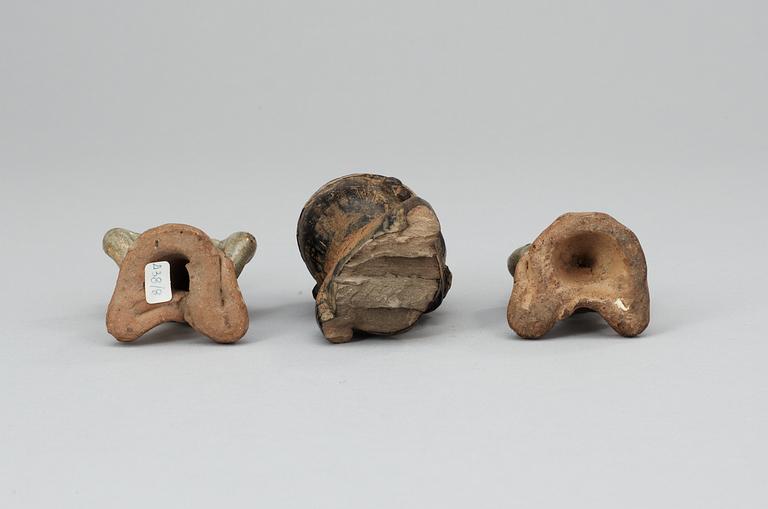 A set of three pottery figures, South America and Thailand.