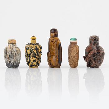 Ten snuff bottles, mottled stone, China, 20th century.