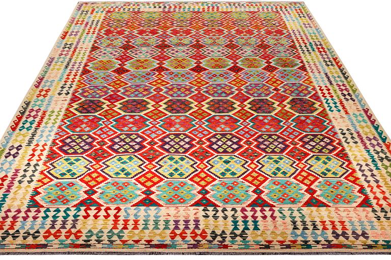 A Kilim carpet, c. 491 x 310 cm .