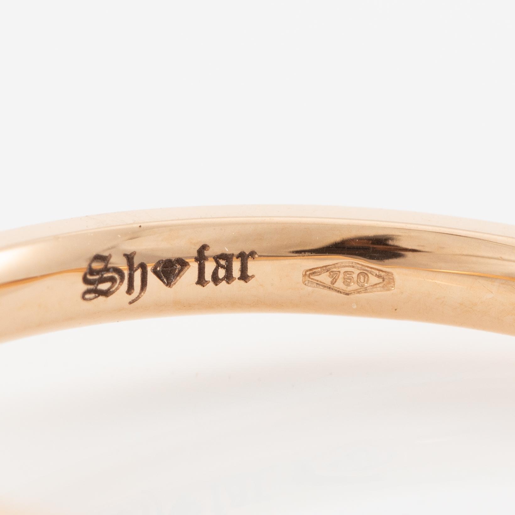 Ring in 18K gold set with brilliant-cut diamonds.