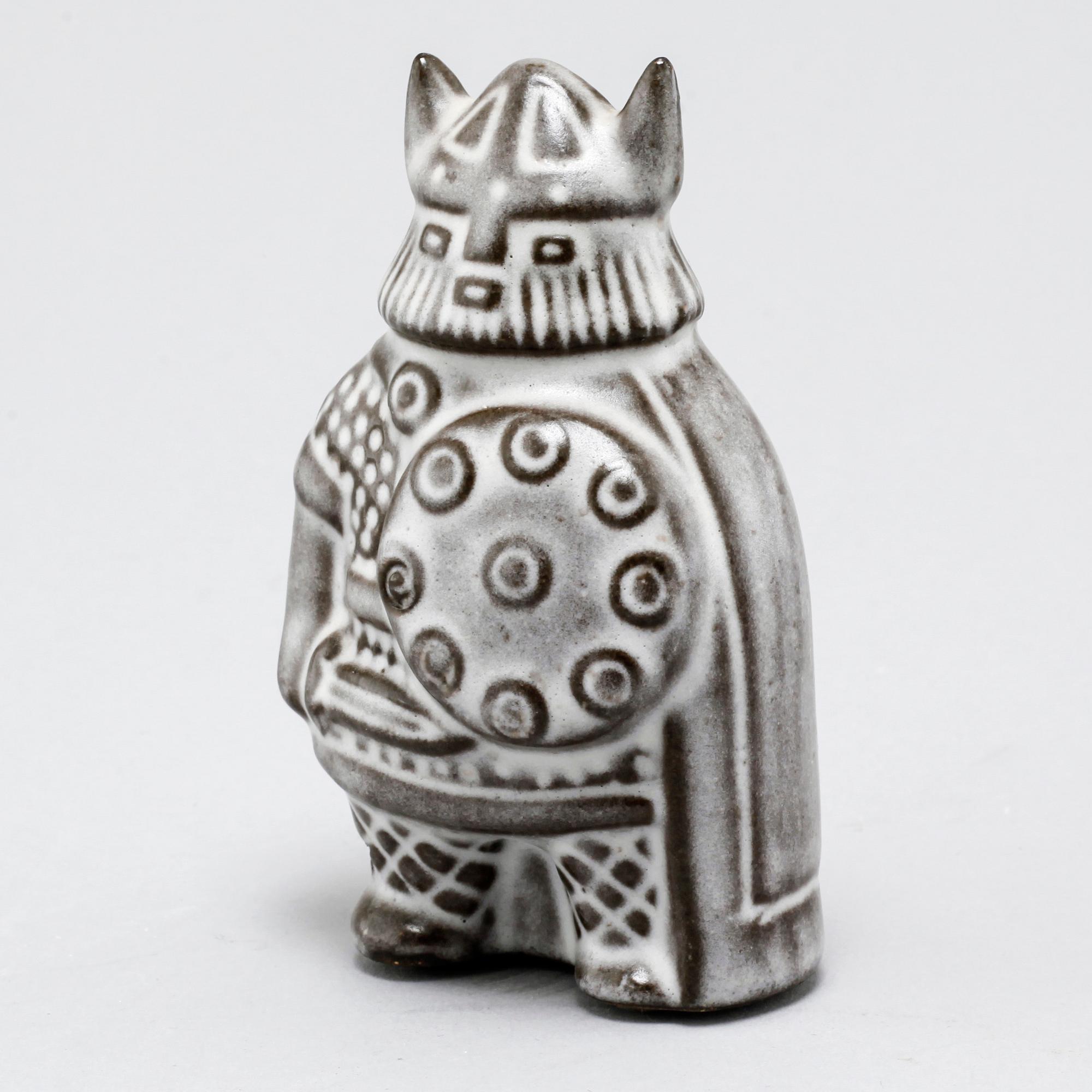 Eight stoneware figurines by Uppsala-Ekeby, from the latter half of the 20th century.